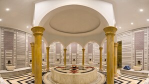 A luxurious interior with a central circular fountain, marble flooring, and ornate columns. - Rixos Borovoe (Burabay)