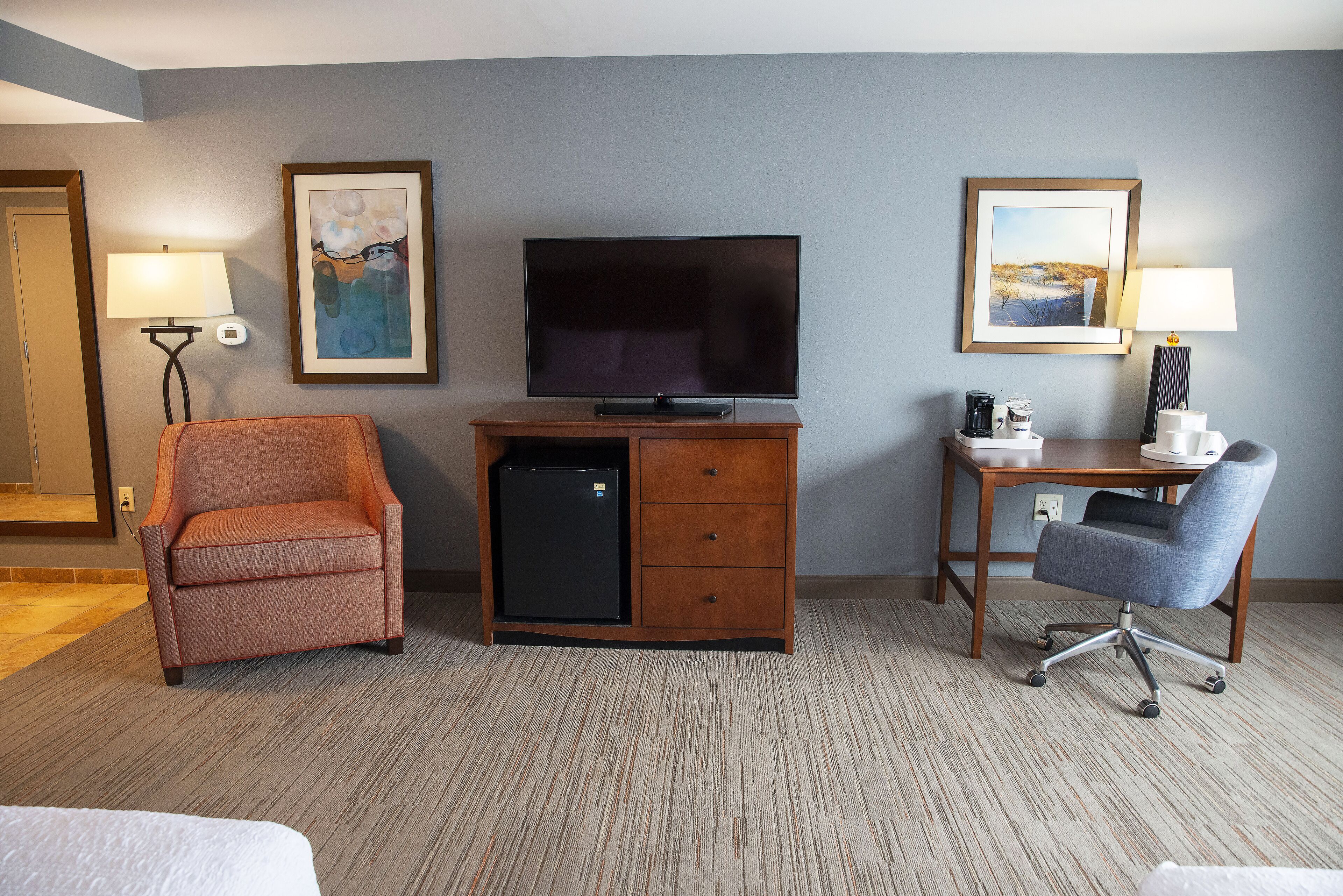 desk, laptop workspace, blackout curtains, iron/ironing board