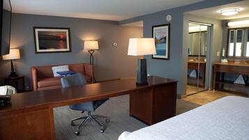 Desk, laptop workspace, blackout curtains, iron/ironing board