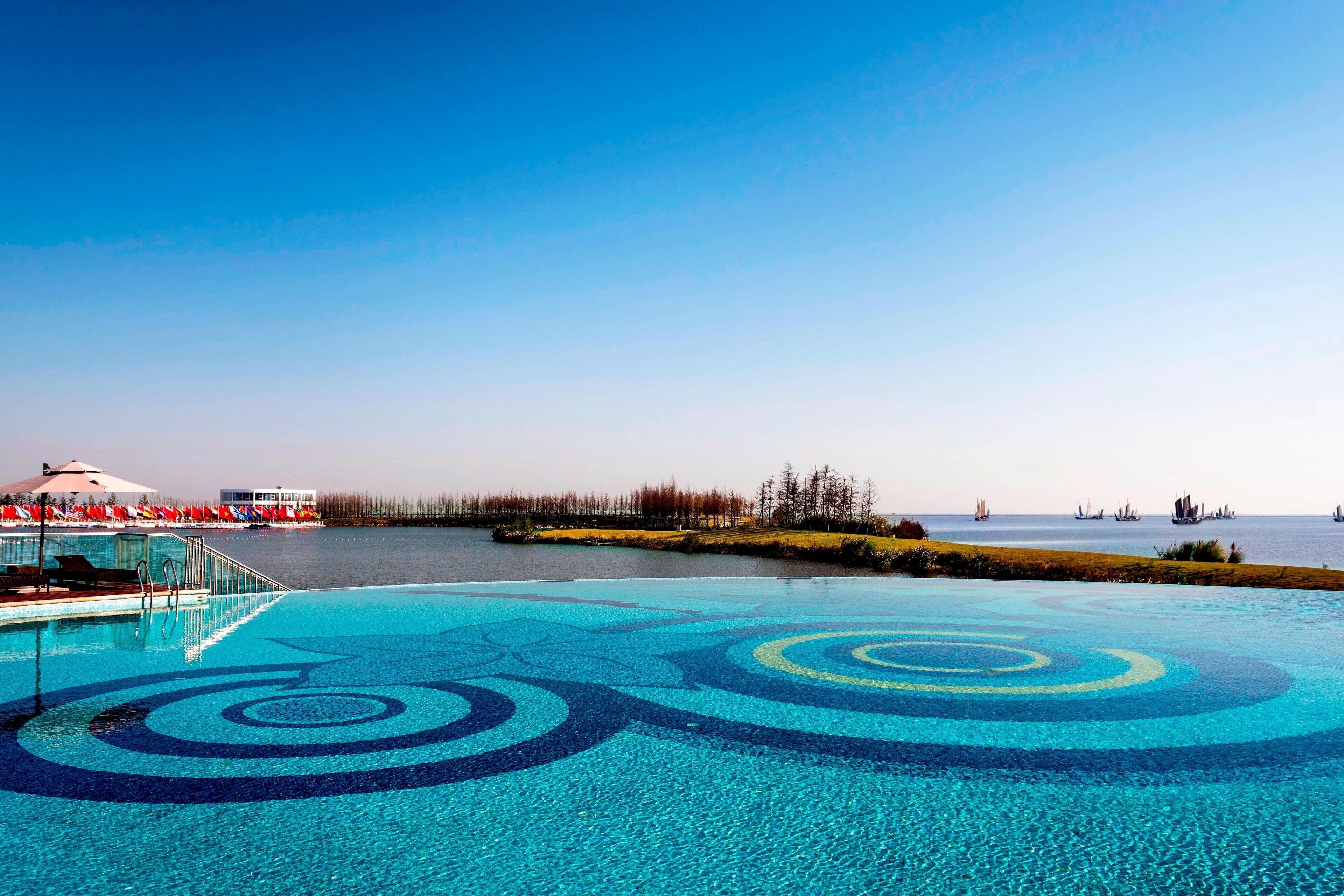 indoor pool, outdoor pool, pool umbrellas