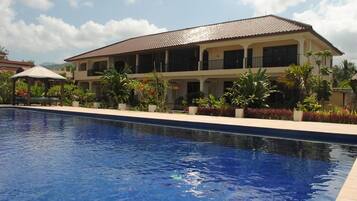 Outdoor pool, pool umbrellas, pool loungers