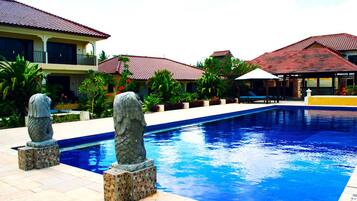 Outdoor pool, pool umbrellas, pool loungers