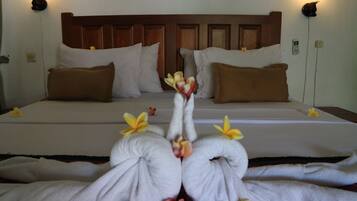 Family Room, Pool View | Free minibar items, in-room safe, desk, iron/ironing board