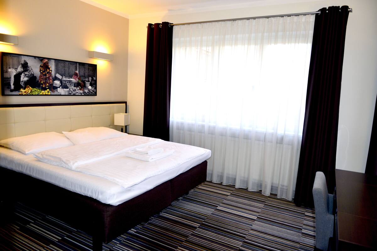 Hypo-allergenic bedding available, minibar (free items), in-room safe