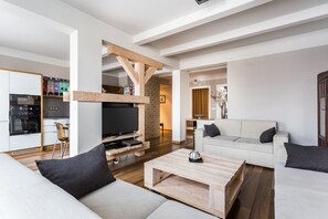 Standard Apartment, 2 Bedrooms | Living area | Flat-screen TV, DVD player, iPod dock