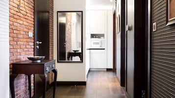 Appartement Deluxe, 2 chambres | Coin séjour | Télévision à écran plat, lecteur de DVD, station d'accueil iPod