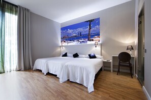 In-room safe, individually furnished, desk, blackout curtains