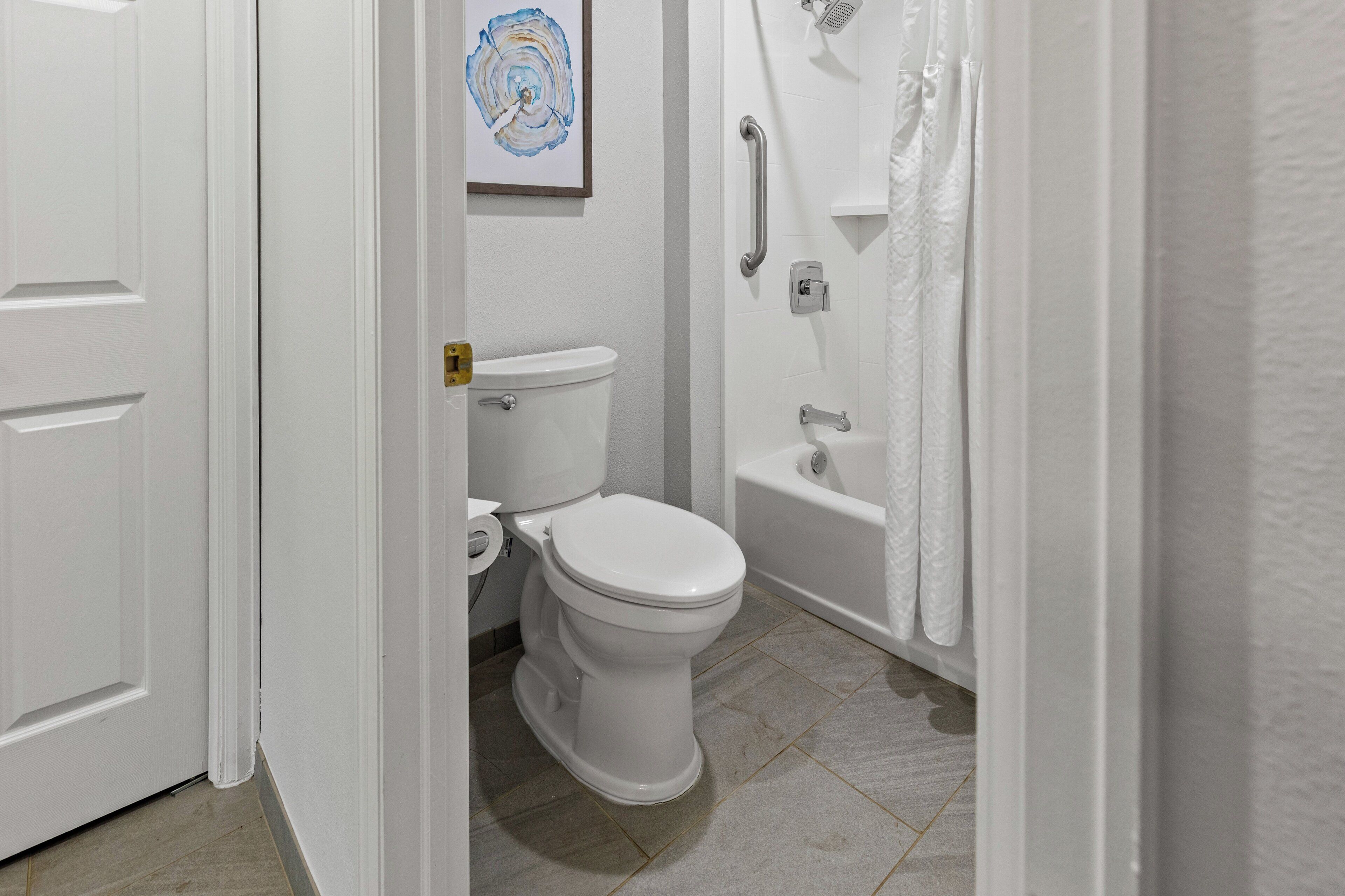 condo, 2 bedrooms | bathroom | combined shower/bathtub, hair dryer, towels