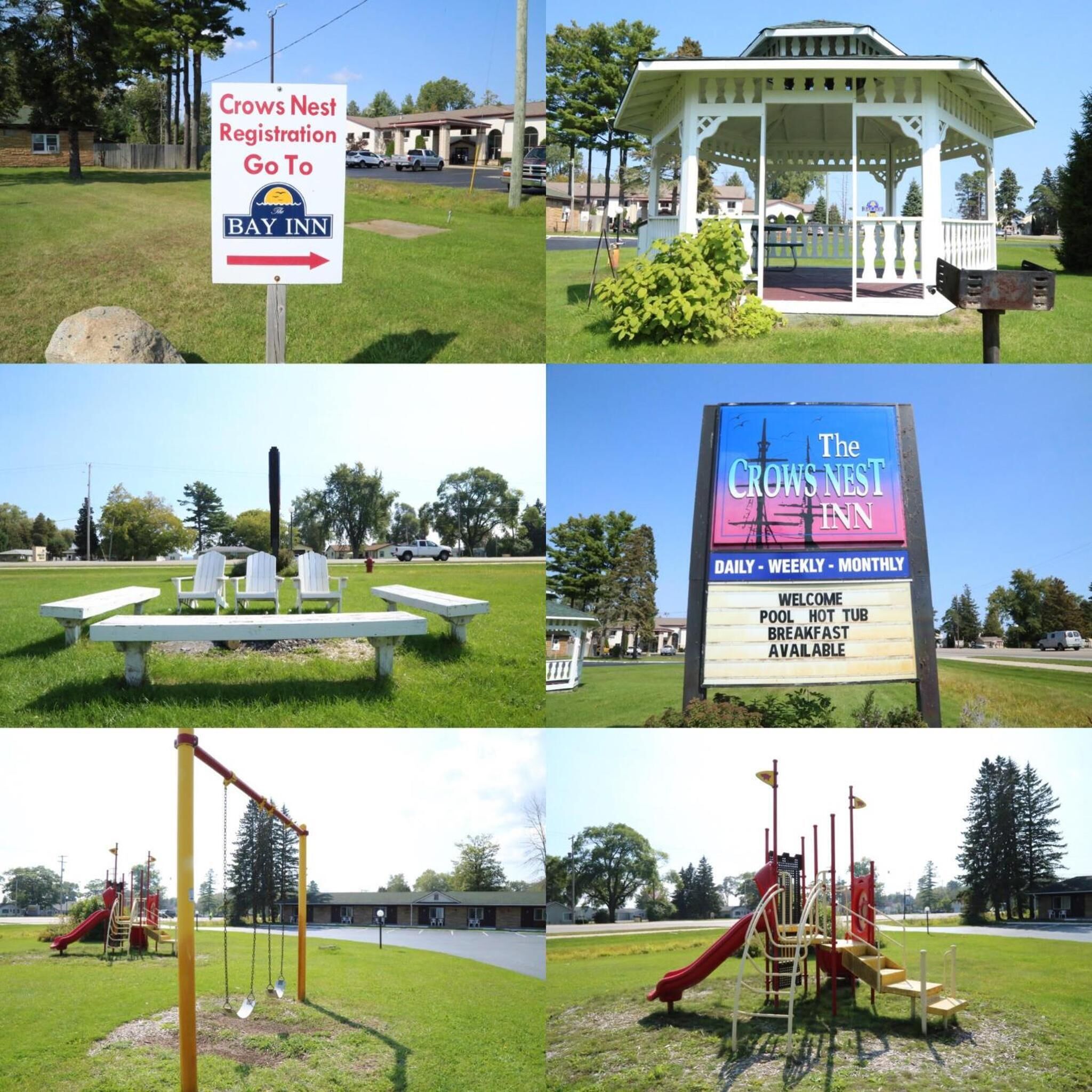 A park with picnic tables, a gazebo, a playground, and a sign directing to the Crow's Nest Inn.