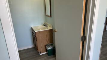 Standard Suite, 1 King Bed (No pets allowed) | Bathroom | Shower, towels