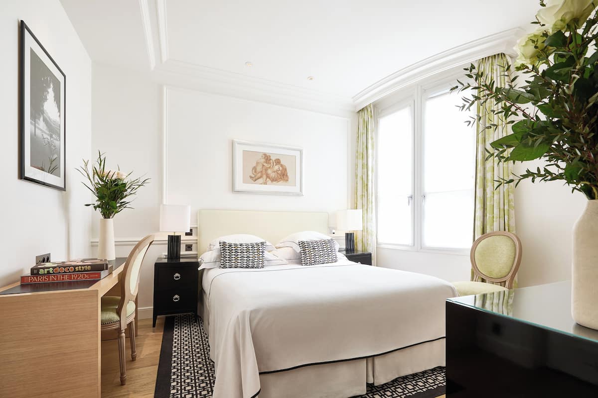 Premium bedding, down comforters, pillowtop beds, minibar
