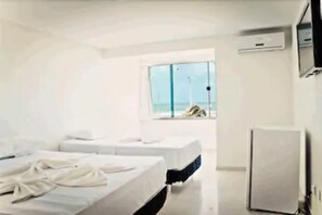 Quadruple Room, Sea View | Minibar, free WiFi, bed sheets