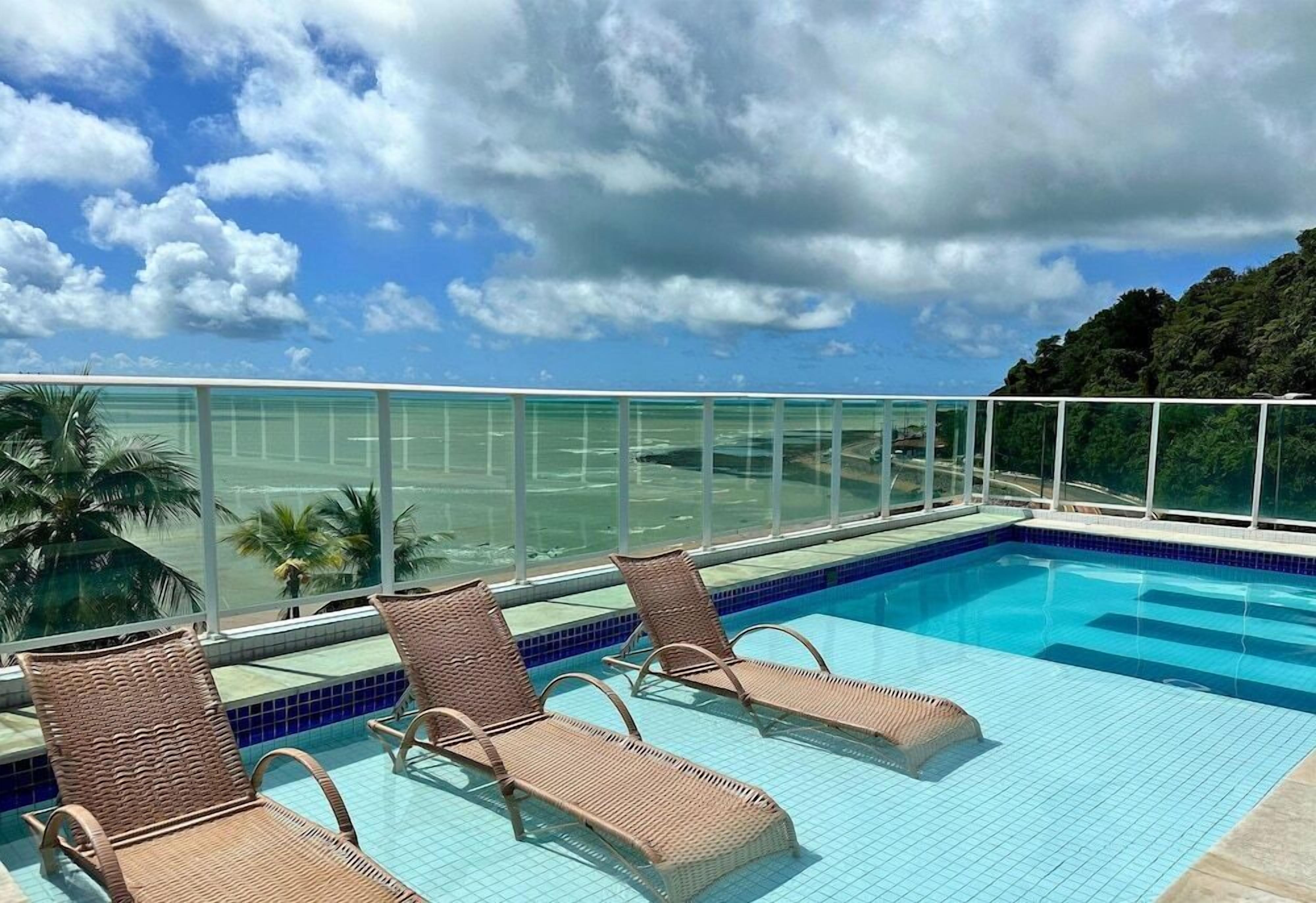 Outdoor pool, pool umbrellas, pool loungers