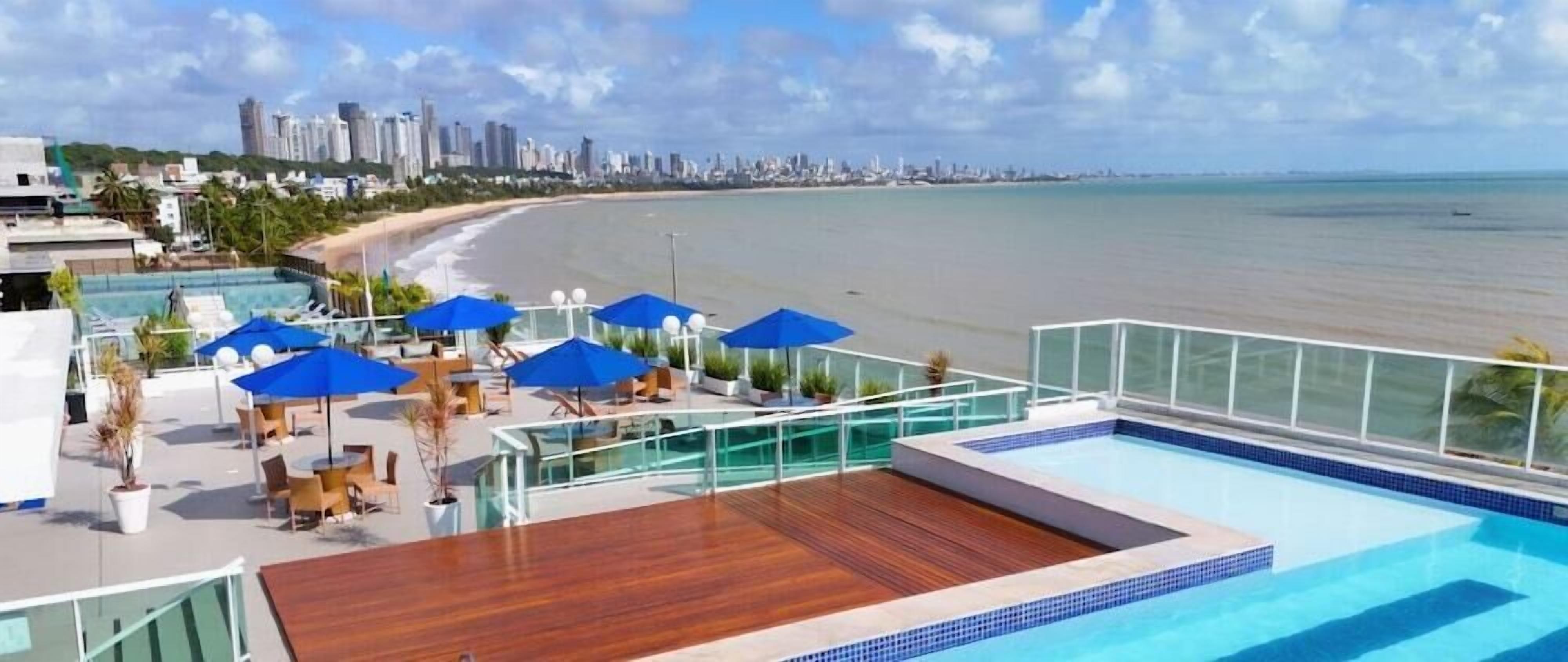 Outdoor pool, pool umbrellas, pool loungers