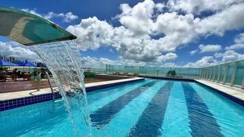 Outdoor pool, pool umbrellas, sun loungers