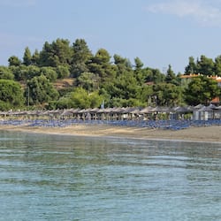 On the beach, sun-loungers, beach umbrellas, scuba diving