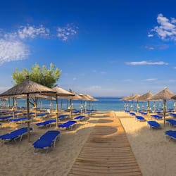 On the beach, sun-loungers, beach umbrellas, scuba diving