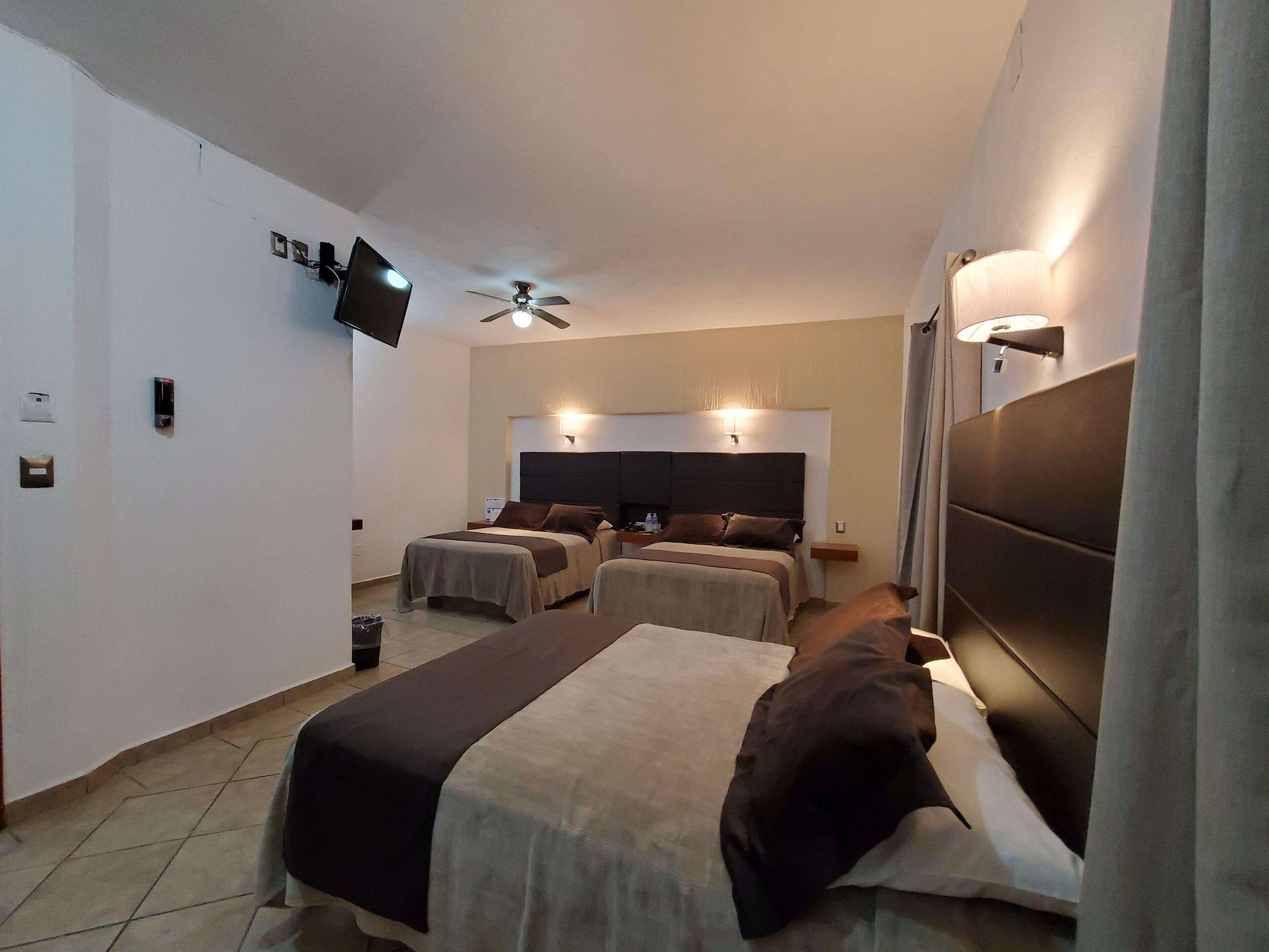 family room, multiple beds | in-room safe, desk, free wifi, bed sheets