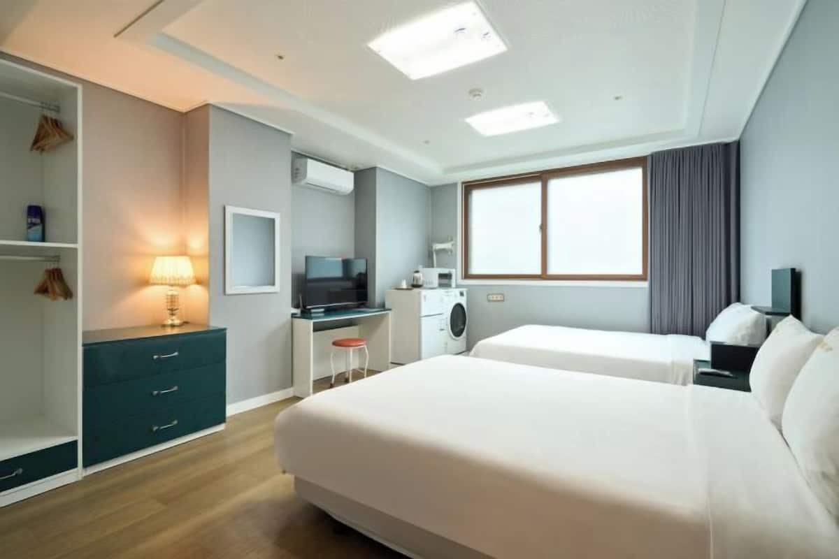 Blackout drapes, soundproofing, iron/ironing board, WiFi (free)
