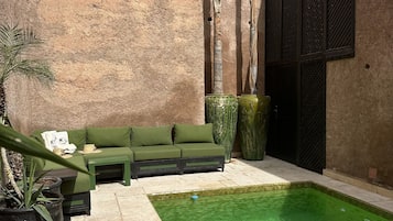 Outdoor pool, pool umbrellas, sun loungers