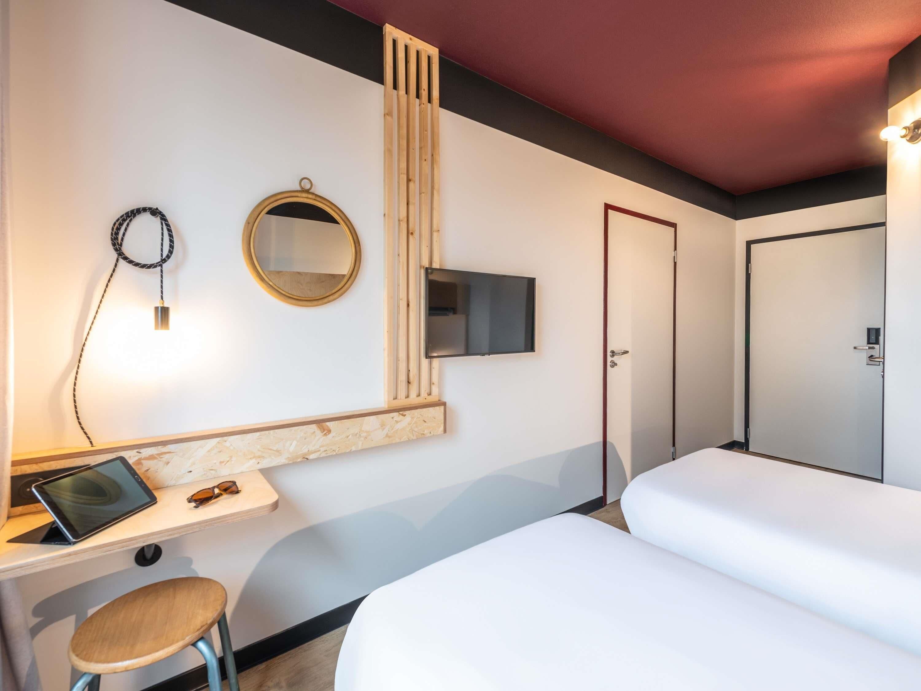 Premium bedding, desk, laptop workspace, soundproofing