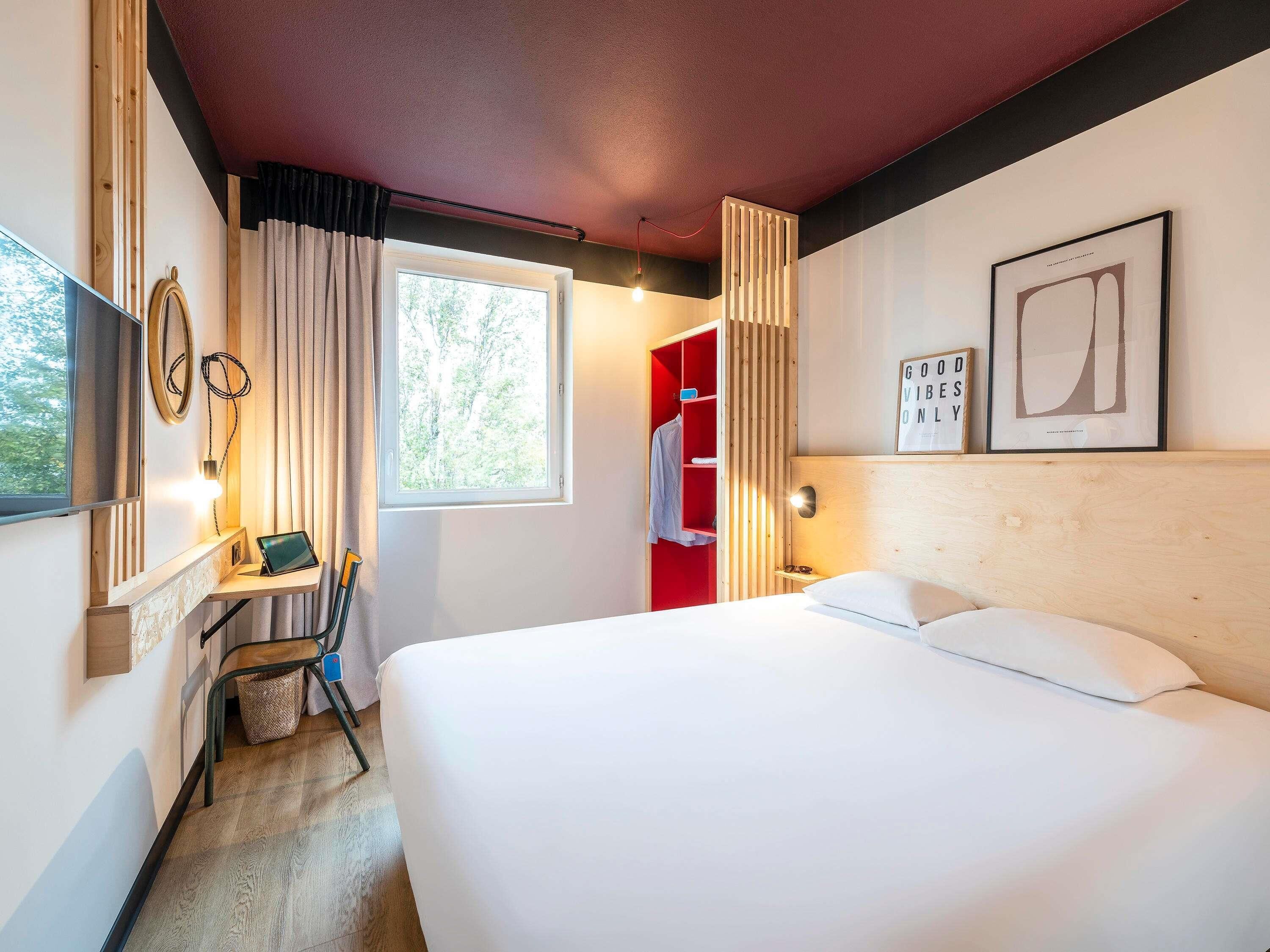 Premium bedding, individually furnished, desk, laptop workspace