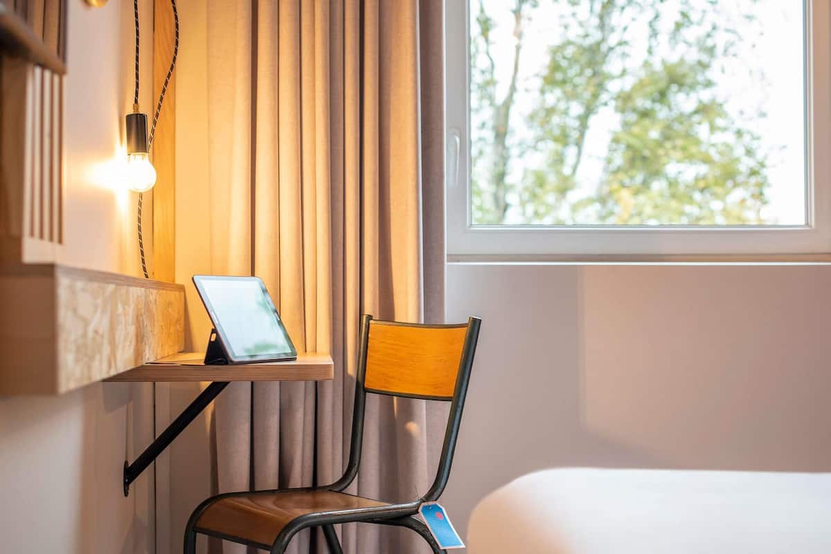 Premium bedding, individually furnished, desk, laptop workspace