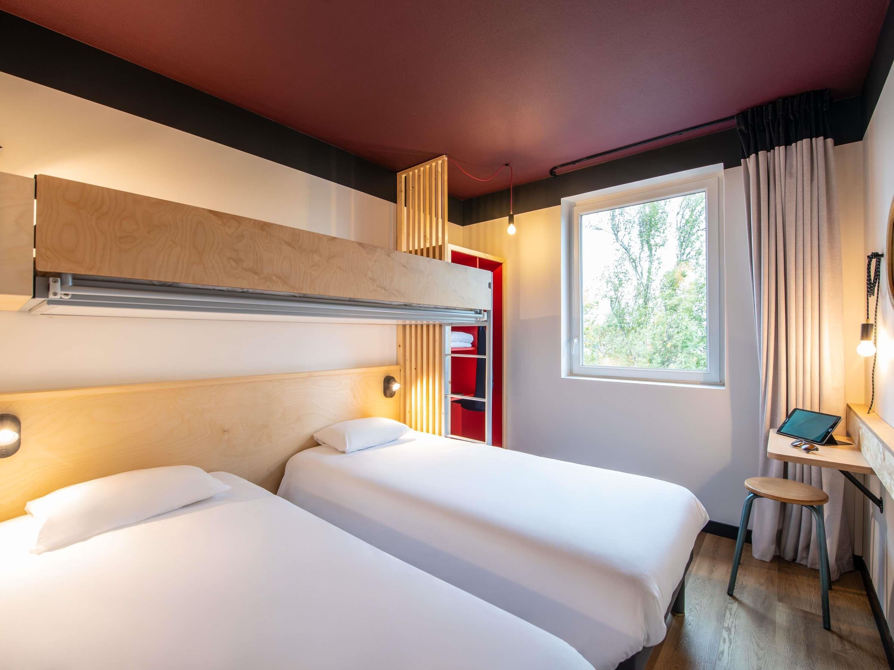 Room, 3 Twin Beds | Premium bedding, individually furnished, desk, laptop workspace