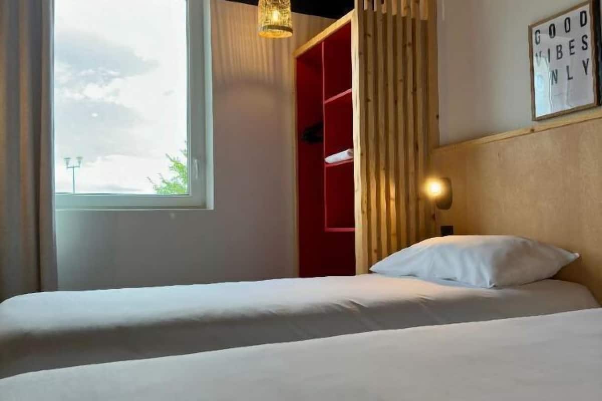 Premium bedding, individually furnished, desk, laptop workspace