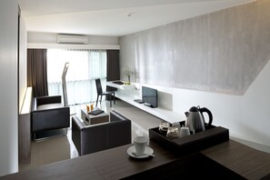 Suite – executive | Oppholdsområde | Flatskjerm-TV