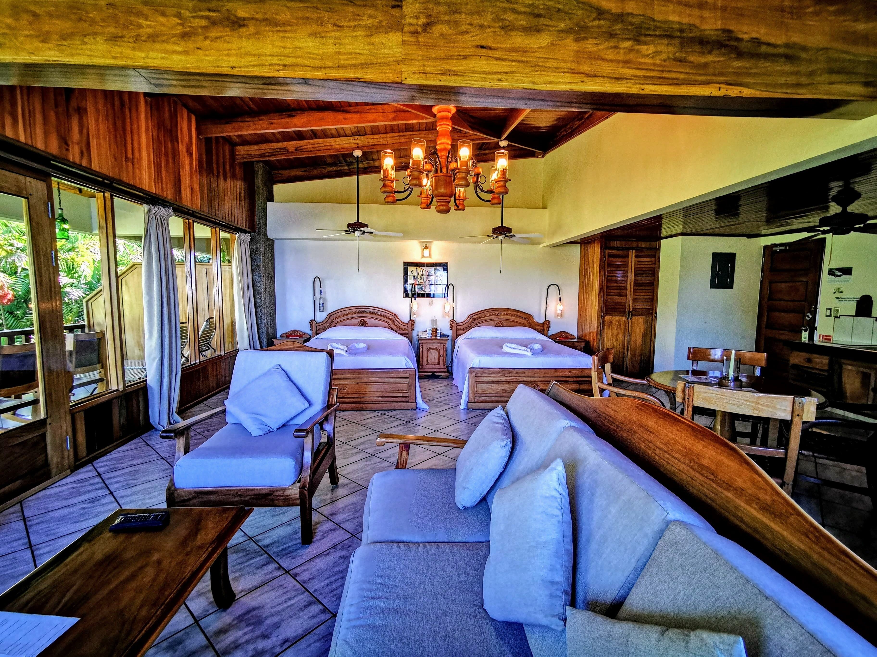 studio, jungle view - adults only | living area | flat-screen tv