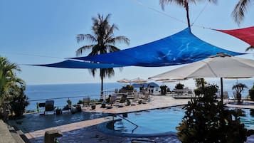 3 outdoor pools, pool umbrellas, pool loungers