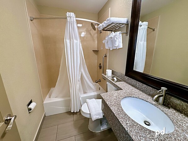 Combined shower/tub, rainfall showerhead, hair dryer, towels