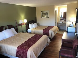 Huone, 2 parisänkyä, tupakointi sallittu | Äänieristys, silitysrauta/-lauta, ilmainen Wi-Fi, vuodevaatteet