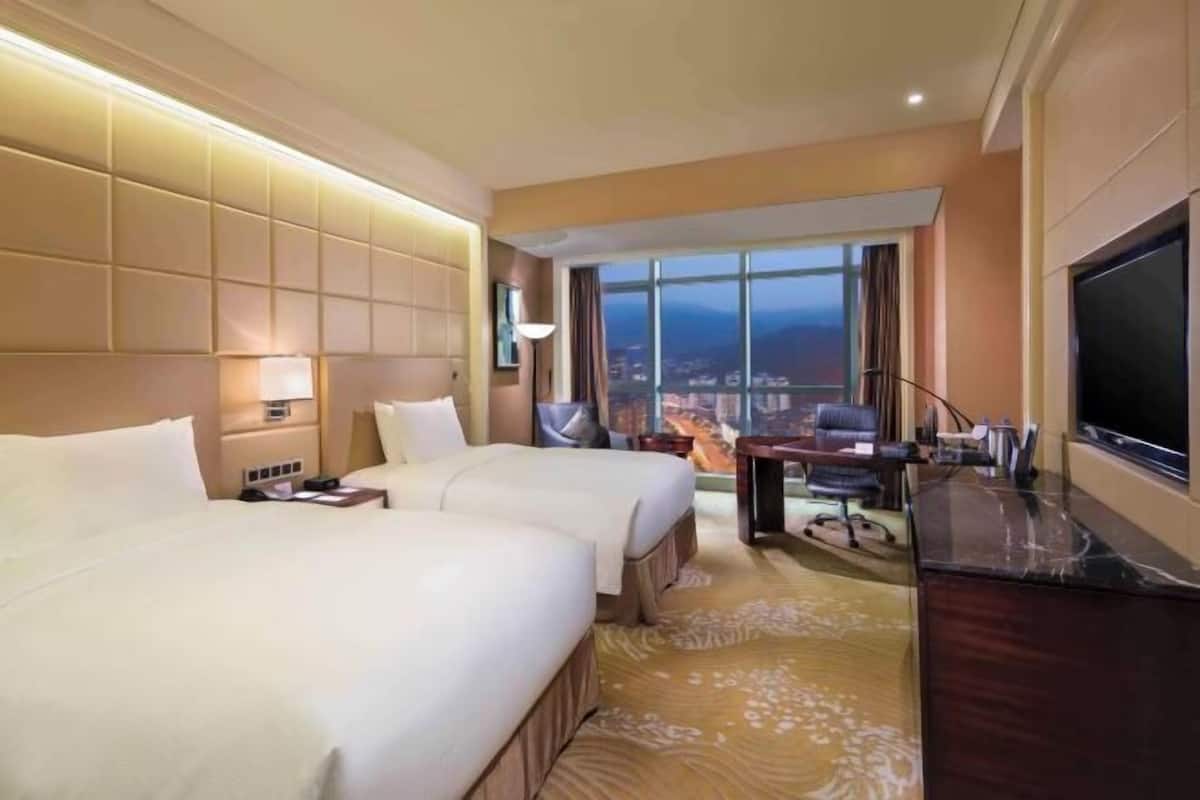 Premium bedding, minibar, in-room safe, blackout drapes