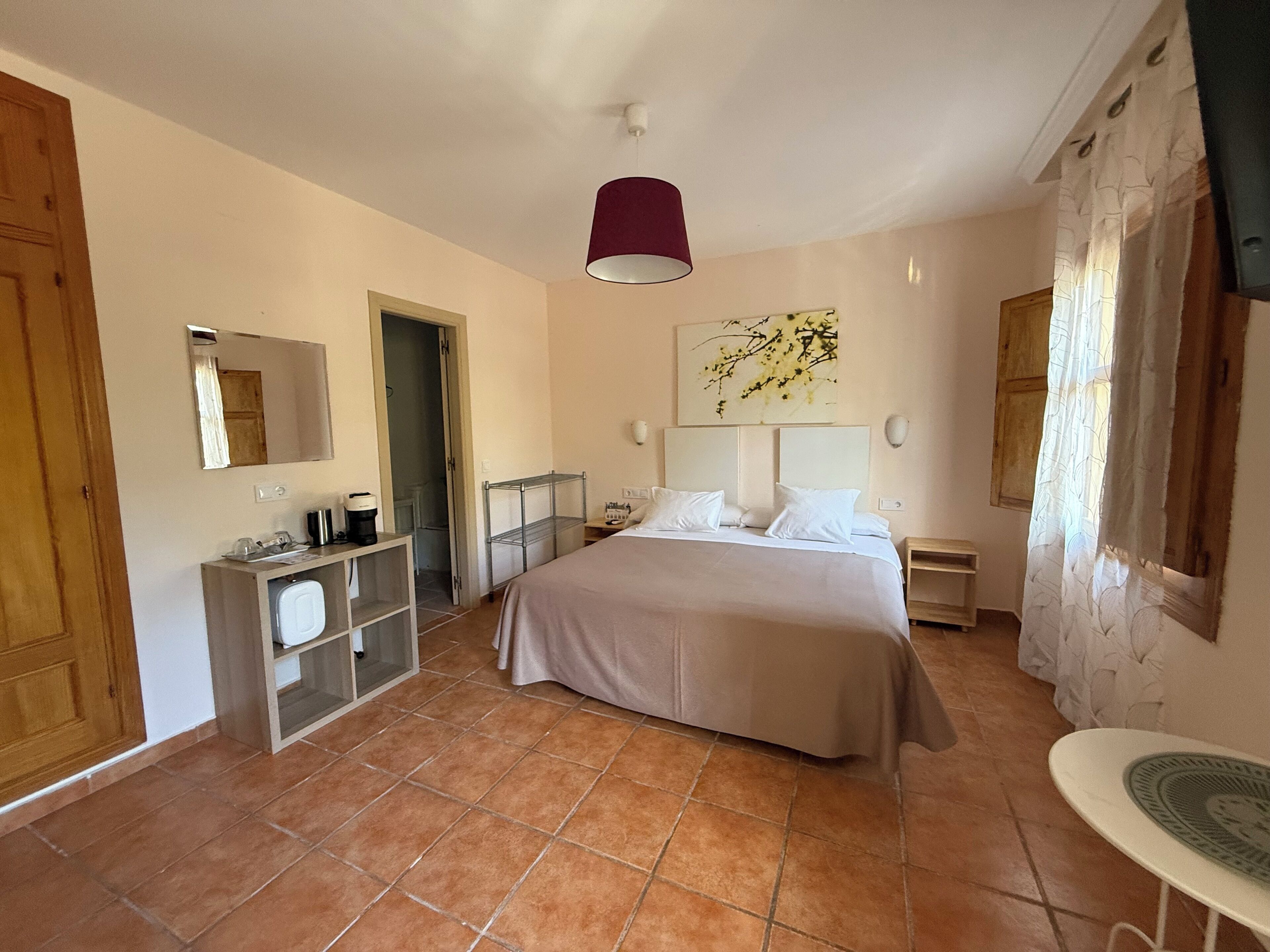 Habitación familiar doble | 1 dormitorio, cortinas opacas, wifi gratis y ropa de cama