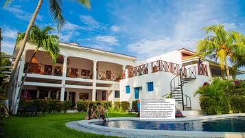 Outdoor pool, open 10:00 AM to 10:30 PM, pool loungers