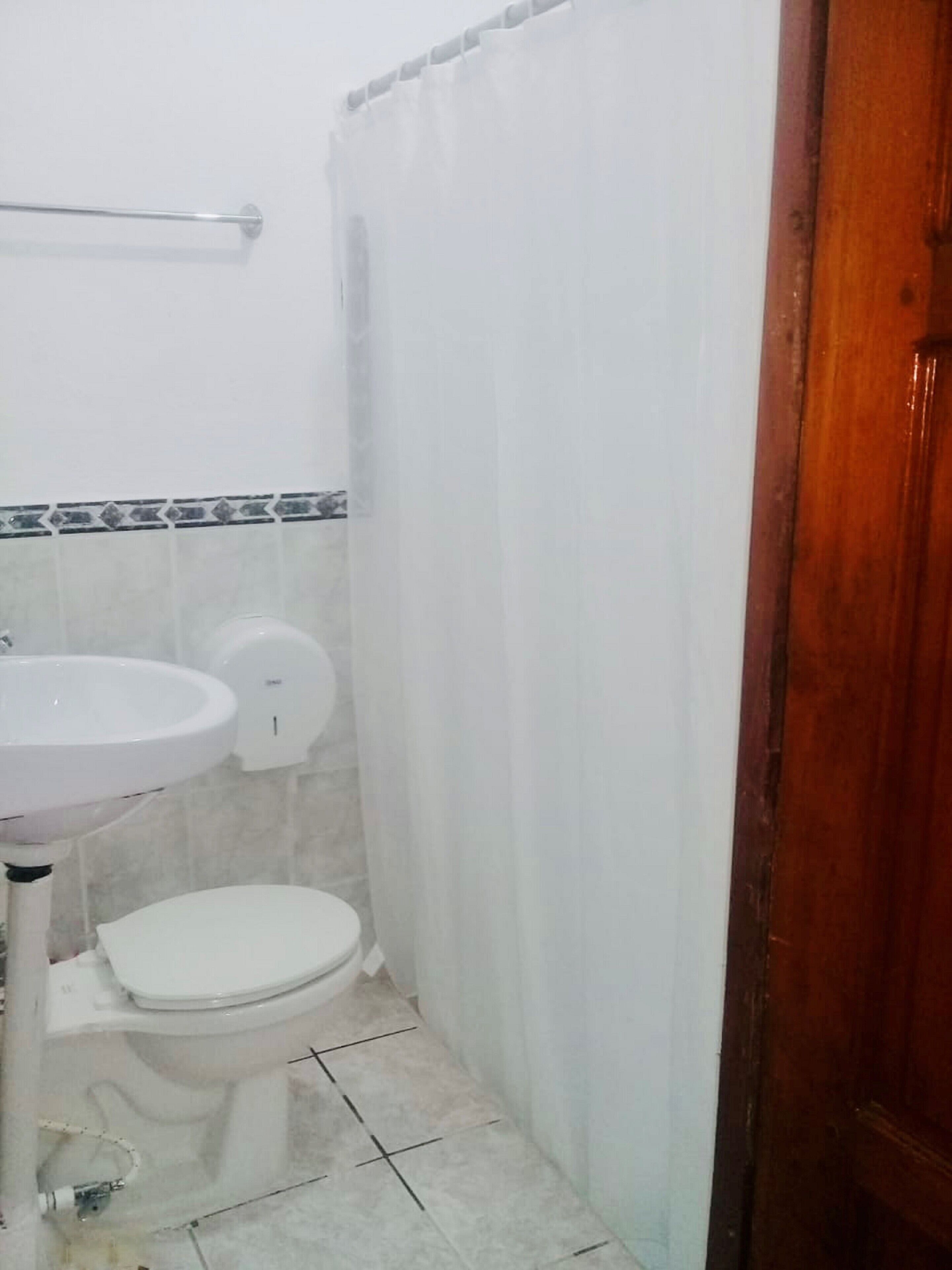 basic double room | bathroom | shower, hair dryer, towels, soap