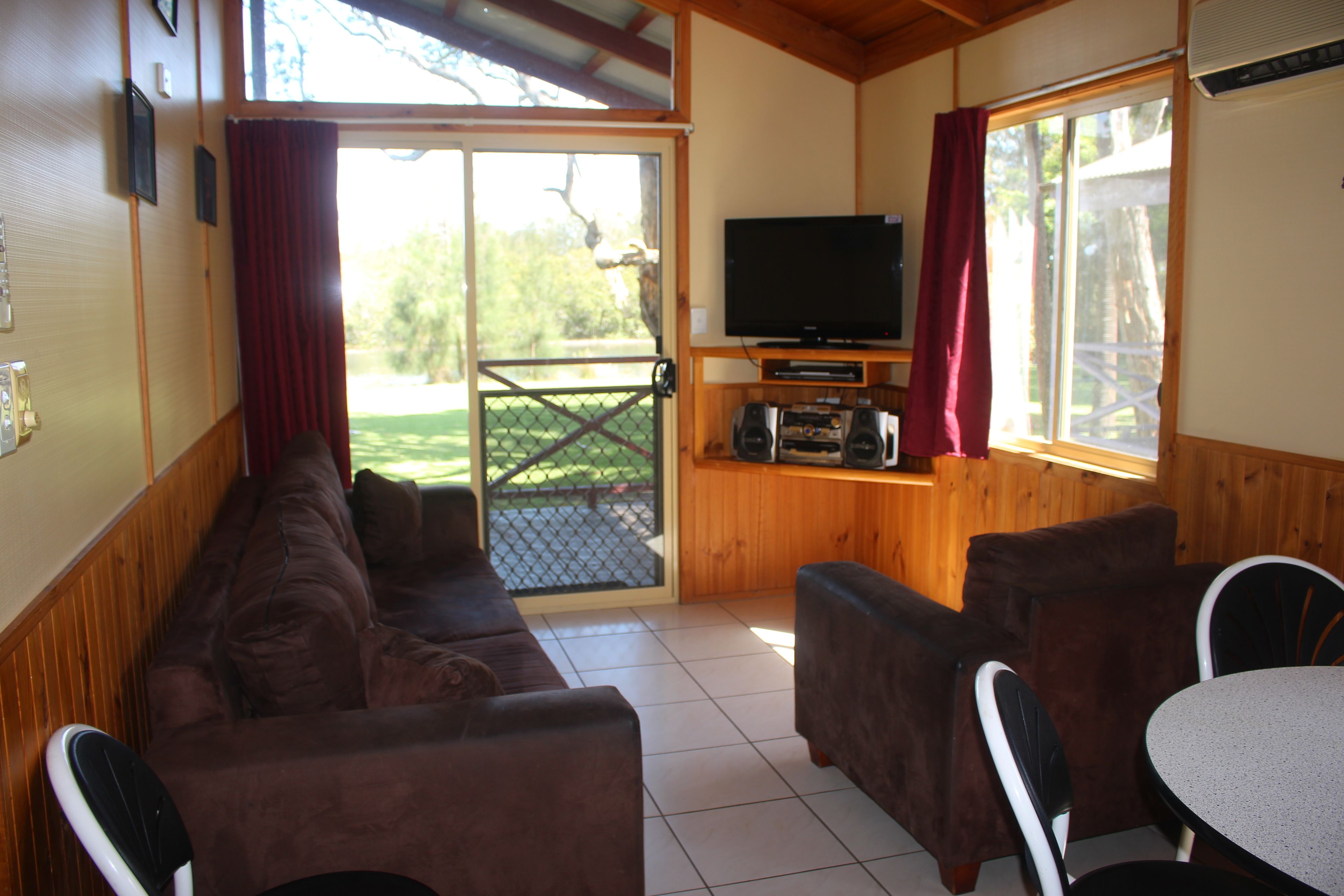 Family Cabin | Living area | 24-inch TV with digital channels