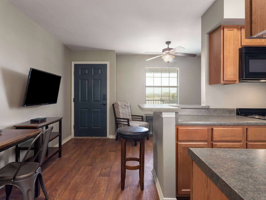 Suite, 1 Bedroom, Non Smoking | 1 bedroom, desk, laptop workspace, iron/ironing board