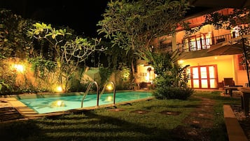 Outdoor pool, open 7:00 AM to 7:00 PM, pool umbrellas, sun loungers