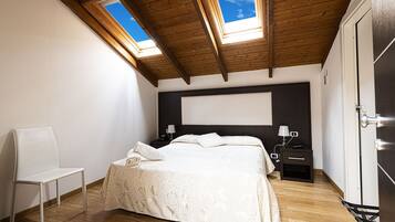 Premium bedding, down duvets, minibar, in-room safe