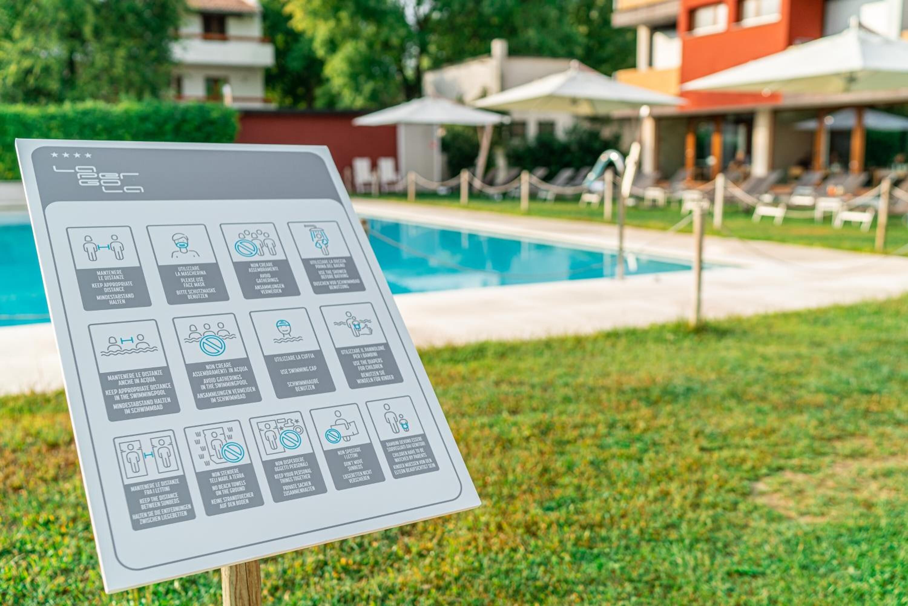 seasonal outdoor pool, open 9 am to 7:30 pm, pool umbrellas