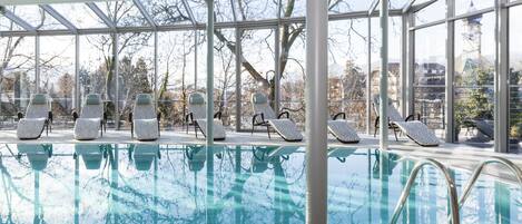 Indoor pool, seasonal outdoor pool, open 7 AM to 8 PM, pool umbrellas