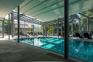 Indoor pool, seasonal outdoor pool, open 7 AM to 8 PM, pool umbrellas