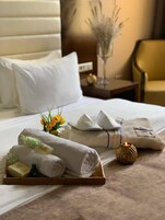 1 多间卧室、高档床上用品、迷你吧、客房内保险箱