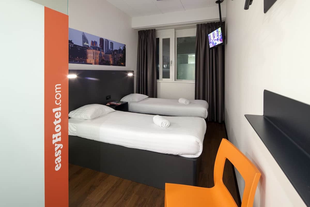 Twin kamer | Verduisterende gordijnen, een strijkplank/strijkijzer, gratis wifi