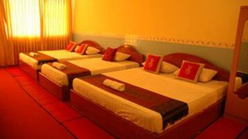 Deluxe Triple Room | Pillowtop beds, minibar, individually decorated, individually furnished