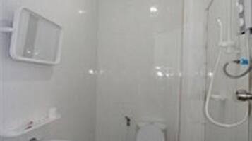 Separate tub and shower, designer toiletries, slippers, towels