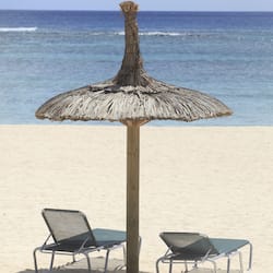 On the beach, white sand, free beach cabanas, sun-loungers